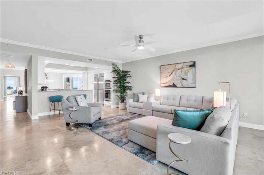 Discover elevated coastal living at 265 Indies Way, Unit #1404—a stunning sky residence where refined luxury, peaceful privacy, and sweeping Gulf-to-golf views come together in the most exclusive tower of The Dunes: Grande Geneva. Tucked away at the quiet edge of the community and surrounded by sparkling waterways and lush preserves, Grande Geneva offers unmatched seclusion within this prestigious Naples enclave. A private elevator opens directly into your home, immediately setting a tone of sophistication and exclusivity.

This beautifully reimagined 3-bedroom, 3-bath sanctuary features polished marble flooring throughout the main living areas, blending timeless elegance with modern coastal design. It includes two assigned garage spaces and a rare transferable membership to The Floridian Club, an exclusive private beach club with daily shuttle service, full beachside food and beverage service, and effortless access to Naples’ pristine white sands.

Residents of Grande Geneva enjoy resort-style amenities including a heated pool and spa, a state-of-the-art fitness center, a stylish social lounge with catering kitchen, and outdoor grilling areas.

From the moment you enter, you are greeted with panoramic Gulf and golf course views. The kitchen, living room, screened lanai, and primary suite showcase unforgettable sunsets over the Gulf, while the secondary bedrooms enjoy serene morning light and lush fairway vistas. The open layout is designed for elevated coastal living, with soaring ceilings, abundant natural light, and seamless flow throughout.

The chef’s kitchen is beautifully appointed with premium appliances, granite countertops, a wine cooler, and custom cabinetry. The living area opens to a screened lanai where Gulf breezes and glowing sunsets create the ideal setting for relaxation.

The primary suite offers a private retreat with lanai access, a spa-inspired bath, an expansive walk-in closet, and a wall-mounted TV. The second bedroom features ensuite privacy with its own TV, while the third enjoys peaceful golf course views and access to a nearby full guest bath. All bedrooms include high-quality bamboo bedding.

Life at The Dunes is exceptional. Residents enjoy access to the award-winning Club at the Dunes, recognized by BoardRoom Magazine and Forbes Travel Guide. Amenities include a cascading waterfall resort pool, zero-entry design, a vibrant tiki bar with poolside service, and a world-class restaurant led by an award-winning chef. Evenings end around the fire pit, while guests enjoy the convenience of six luxury on-site cottages.