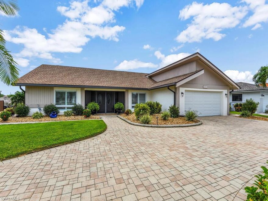 Searching for Direct Gulf Access with must have "Southern Exposure"~~~Your Search is Over! Explore this Beautiful Waterfront Home located in SE Cape Coral's Desirable "Everest Neighborhood". Just Mins to the River from your Private Dock, watch Boats Parade by on the 200' Wide Lido Canal. Home just under 2100 Sq Ft of Living Space & Features 3 Beds & 2 Baths, Large Formal Living & Dining Room, plus Family Room w/Pocketing Sliders opening to your Gorgeous Lanai & Pool Area. Saltwater Pool was Recently Resurfaced & has 2 Playful Dolphin Mosaics swimming just under the surface! Pool is also Solar Heated, so you are always ready for a Swim. Other Recent Updates include New Quartz Countertops, Custom Plantation Shutters, Master Bath Vanity, Newer Roof, AC, Pool Pump, Tankless Water Heater. Home is Beautifully Landscaped w/Low Maintenance Tropical Plantings, Circular Driveway & Paver Walkways surround the home. Boaters will enjoy the New Boat Dock w/Plastic Decking & 16K Rated Lift & NO BRIDGES!!! Home also equipped w/Whole House Solar Electric Assist System, virtually Eliminating most of your monthly Electric Bills! Safe Home, NO RECENT STORM DAMAGE AND NO FLOODING. It just doesn't get any better than this!!!