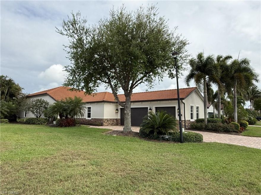 Welcome to Paloma at Bonita Springs. This former model home offers 2,338 square feet of well-designed living space, combining comfort, style, and functionality.

The open-concept floor plan features a spacious living, dining area and kitchen, with tray ceilings and tile flooring throughout the main living spaces. The home includes 3 bedrooms, 2 bathrooms, plus a den, ideal for a home office or additional flexible space. Newly painted in 2025

Enjoy indoor-outdoor living on the extended lanai, complete with a custom pool and spa, outdoor kitchen, and a private, landscaped backyard—perfect for relaxing or entertaining with family and friends.

Additional features include a large laundry room and a 3-car air conditioned garage, with a storage room.

Paloma is a family-friendly community offering a fun lifestyle, clubhouse with a fitness center, billiards, community room, bocce, tennis courts, and a resort-style pool. Close to Coconut Point Mall, Bonita Beach, and RSW Airport.