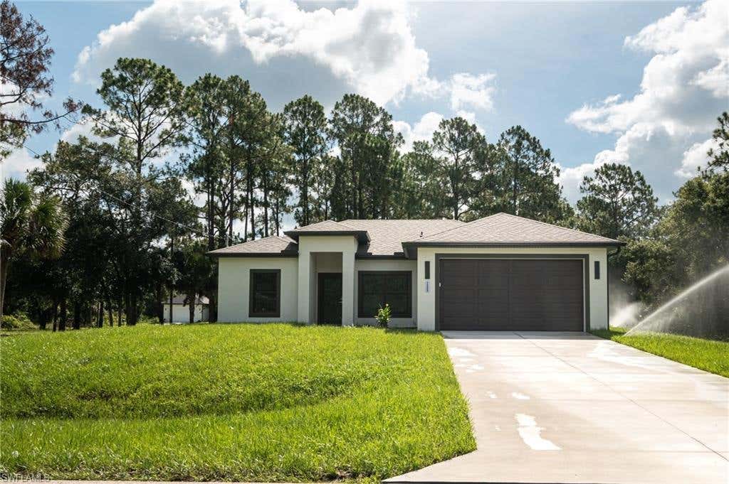 Photo of 135 McArthur BLVD, LEHIGH ACRES, FL 33974 (MLS # 226023587)