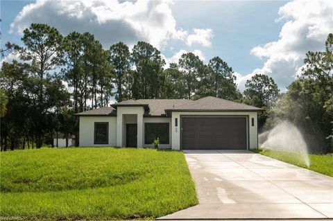 Photo of 135 McArthur BLVD, LEHIGH ACRES, FL 33974 (MLS # 226023587)