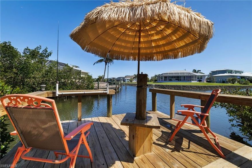 ** $45,000 PRICE IMPROVEMENT** GULF ACCESS & POOL PARADISE awaits in Punta Gorda – Rest assured knowing this home was untouched by recent storms and is turn-key ready! NO HOA OR DEED RESTRICTIONS! This waterfront gem offers stunning views and unparalleled peace of mind. This meticulously maintained 3-bedroom, 2-bathroom modular home, boasting 1,188 sq ft. was built to withstand the elements.  This home was Precision-engineered in a climate-controlled environment, and was crafted to meet and exceed the International Residential Code (IRC) standards, ensuring exceptional durability, efficiency, and structural integrity—far beyond that of a typical home built on-site. Fully insurable & eligible for conventional financing. Built with enhanced framing, energy-efficient materials, and precise engineering, this home offers greater resistance to wind, moisture, and the elements compared to traditional builds resulting in a stronger, longer-lasting home! This home showcases a stunning new pool (2024) nestled within a spacious 850 sq ft screened-in lanai, offering privacy and the ultimate outdoor living experience. Enjoy breathtaking sunrises! Shaded afternoons make it perfect for quiet evenings to unwind or entertain under the stars in this charming outdoor oasis. The newly constructed (2024) 450 sq ft two-car garage provides ample space for vehicles and storage.  Along with a newly constructed driveway of 3/8 lime rock and shells add to the allure. Updated (2024) Dock allows you to fish right from your backyard and relax under your Tiki umbrella! A quick 20-minute boat ride takes you to the Riviera and out to Charlotte Harbor and the Gulf, making this a boater’s and angler’s paradise. This home is lovingly maintained and lightly use as a seasonal retreat, and is truly move-in ready. Whether you choose to live here year-round or “lock and leave” with confidence, this is a rare opportunity to own a high-and-dry, Gulf-access home with a new pool and garage for under $400K an unmatched value in SWFL! Prime Location: *Minutes from Punta Gorda Airport (direct flights via Allegiant) *30 minutes from Fort Myers Airport for easy travel ** Optional private community boat ramp & civic association in Charlotte Park ** Don’t miss out—schedule your showing today and experience the best of Punta Gorda waterfront living!