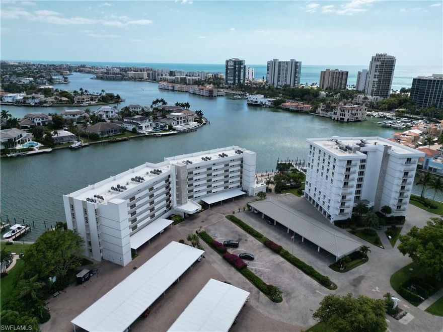 Newly renovated condo unit in Park Shore right on Venetian Bay. Boat Docks and Kayak racks right on the back of the building giving you access to the Gulf of Mexico. Walk to the beach through the private Park Shore Beach Park and walk to the Venetian Village luxury shops and restaurants; at a short drive to exquisite amenities at Waterside Shoppes, Mercato and Naples downtown. State of the art new GE appliances, luxury vinyl plank(LVP) flooring, quartz countertop in the kitchen and pendant lights are some of the gracious upgrades. Double stack in-residence washer and dryer. Enjoy the serene views of the water looking out of your bedroom or dining room windows toward Venetian Bay. The community pool also overlooks the bay for pleasant views of Inner Doctor’s Bay and amazing sunsets; a place to call home.