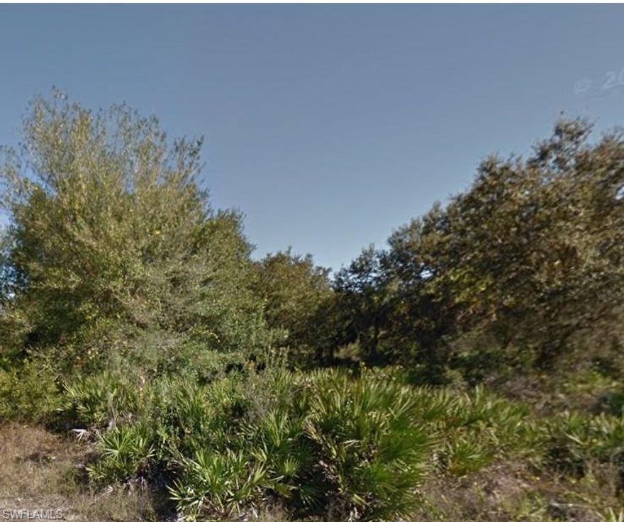 Spacious 0.50-acre residential lot for sale in Lehigh Acres, located in growing Lee County. This oversized half-acre property offers plenty of room to build your custom home with space for a pool, detached garage, or extra outdoor living area. Surrounded by new construction and ongoing development, it’s a great opportunity for homeowners or investors alike. Enjoy a quiet setting while staying close to schools, shopping, and major roadways.