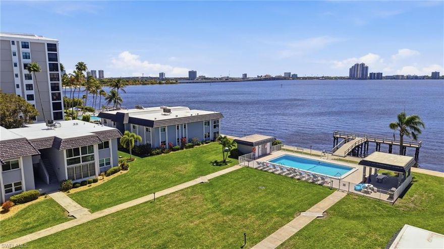 Welcome to easy Florida living in this beautifully maintained riverfront condo located in the sought-after Bay Harbor Club. This 2 bedroom, 2 bathroom residence features an inviting layout with tile and vinyl flooring, a spacious living and dining area, and a well-appointed kitchen complete with pantry and breakfast bar.

Enjoy peaceful river views and fresh air from your screened lanai, creating the perfect space to relax or unwind. The split bedroom floor plan offers added privacy, and impact-resistant windows provide peace of mind.

Additional features include in-residence laundry, covered parking, and a low-rise concrete block building.

Residents of Bay Harbor Club enjoy access to community amenities including a pool, fishing pier, cabana, and BBQ/picnic areas, all set along the riverfront.

Conveniently located in North Fort Myers, just minutes to downtown Fort Myers, shopping, dining, and entertainment.