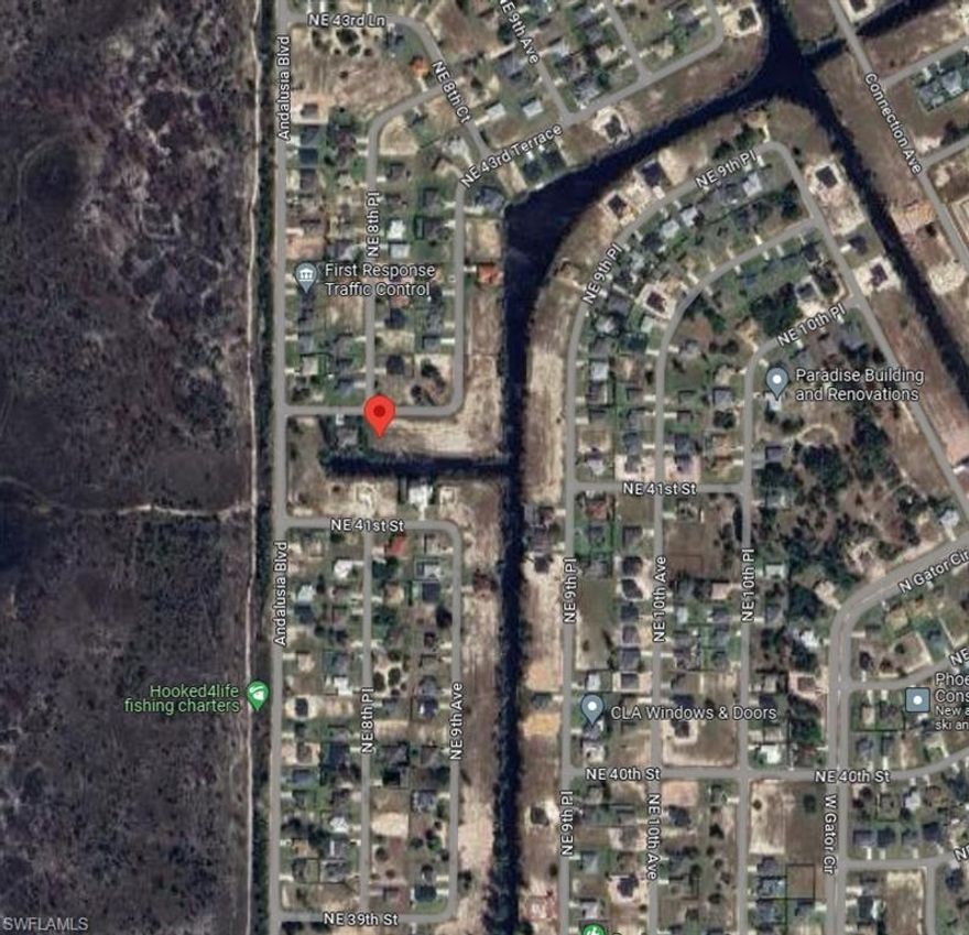 This is the lot you're looking for!   Southern rear exposure and new houses all around on this freshwater canal.  This lot has quick access to Del Prado and 41 so you can quickly be in downtown Fort Myers or Punta Gorda.   Bring your builder and build your dream home.