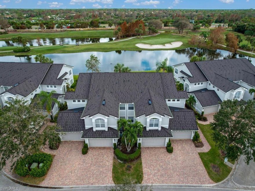 A light and bright condo with expansive views of the gulf course and lake in the much sought after Clubside at The Strand, a gated golf course and tennis community in North Naples is ready for you! Featuring both a golf course and lake view, this spacious first floor end unit coach home has a two car attached garage, glass enclosed lanai with electric storm shutters and is fully furnished. Enjoy watching the golfers on the large screened balcony, living room and eat-in breakfast area. The third bedroom is currently set up as a home office (see the floorplan.) The primary suite includes a walk-in closet, dual sinks and walk in shower. The Club at the Strand, a private club offers 27 championship golf holes, designed by Gordon Lewis, Tennis Center & recently renovated Fitness Complex with state-of-the-art fitness equipment, 8 Har-Tru tennis courts & recently added 3 Pickleball courts, Bocce courts, a heated Jr. Olympic pool and Day Spa. Members enjoy casual & fine dining too! 30 minutes to the International Airport. Minutes from Gulf of Mexico beaches, Regional Park, shopping, dining, museums, galleries & entertainment! Ask about club memberships details & special financing options!