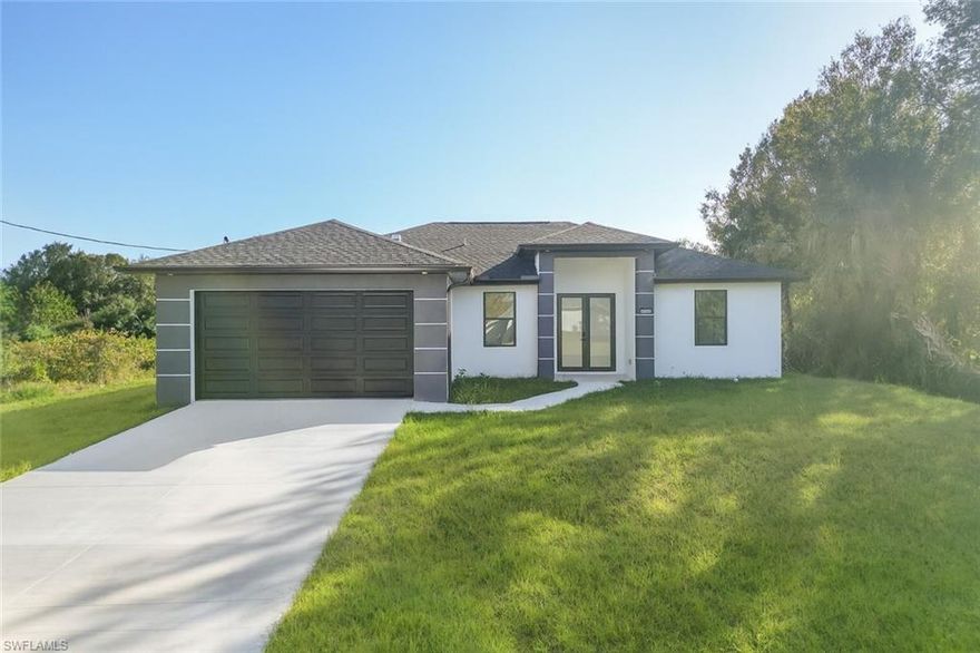 Beautiful 3 bedroom + den, 2 bath home with modern and luxurious finishes. Open floor plan with bright living spaces, elegant bathrooms, and a versatile den perfect for office or guest room. Located on a well-established street in Lehigh Acres, close to shopping, schools, and main roads. an incredible value that makes this property stand out. Easy to show, great opportunity for your buyers – schedule a tour today! BEST PRICE BY SQFT IN THE AREA