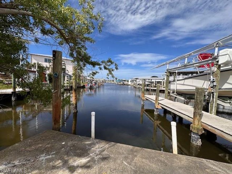 This is the least expensive gulf access lot, without going through locks, available on Pine Island!  This St. James City waterfront lot awaits a new mobile (single or double wide) or build a modular or stick built home!  No impact fees are due if a mobile is replaced on this lot, as the original home was demolished, saving the buyers thousands of dollars.  Water and electric are available.  Enjoy fishing some of the best waters in all of SW Florida!  Boca Grande, "Tarpon Fishing Capital of the World" is just a few minutes away!  Enjoy the beautiful sunsets that Pine Island has to offer, or jump on your boat and watch the sun set over the Gulf of Mexico.  All, just moments away!  Hurry before it's too late!