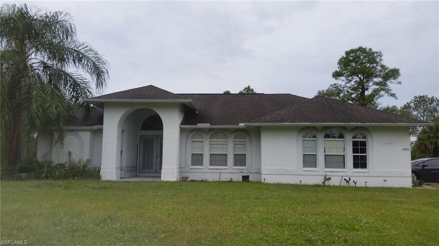 List Priced to sell. Large 3 Br 2 Bath plus a Den, Great Room, Dining room, Large Single Family Pool home on an oversized lot of 2.73 Acres. Located minutes, less than two miles from the new Publix and CVS at the new Orangetree Plaza at the corner of Randall Blvd and Immokalee Rd. Features a 2 car garage, Great room, Dining room, Large Master, split floor plan, Den. Screened-in swimming pool. Additional Carport behind the house for extra storage or you can par 2 additional vehicles. Here you are close to the city but far from the craziness. Enjoy the peace and quiet of Golden Gate Estates. Room to park RV's or your commercial vehicles. This pool home one will not last at this price!!!