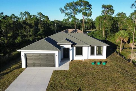 Photo of 411 Eisenhower BLVD, LEHIGH ACRES, FL 33974 (MLS # 2025018636)