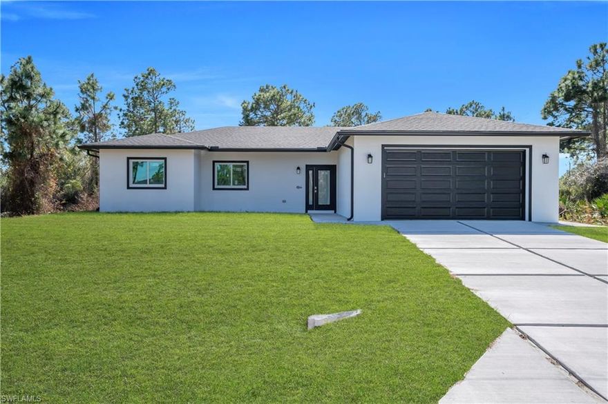 AVAILABLE FOR LEASE WITH OPTION TO OWN. THIS IS NOT YOUR TYPICAL HOME IN LEHIGH ACRES. Built with quality construction and exceptional attention to detail, this stunning residence offers 4 bedrooms, 2.5 bathrooms, and nearly 2,400 total sq. ft. on a quarter-acre lot. The home features an open-concept layout with an expansive covered lanai, ideal for seamless indoor-outdoor living. The kitchen is thoughtfully designed with high-quality cabinetry, a waterfall island featuring Taj Mahal quartzite, and elegant pendant lighting. The same premium stone continues into the bathrooms, creating a cohesive and elevated design throughout. Interior features include porcelain tile flooring throughout, custom-built closets in all bedrooms, and a full laundry room with cabinetry. Additional highlights include impact windows and doors, frameless glass showers, and a 2-car side-entry garage. All appliances are included, including washer and dryer. Conveniently located near SR-82, just minutes from Fort Myers and Southwest Florida International Airport, offering easy access to shopping, dining, and major roadways.
Lease-to-own terms available. Subject to approval.