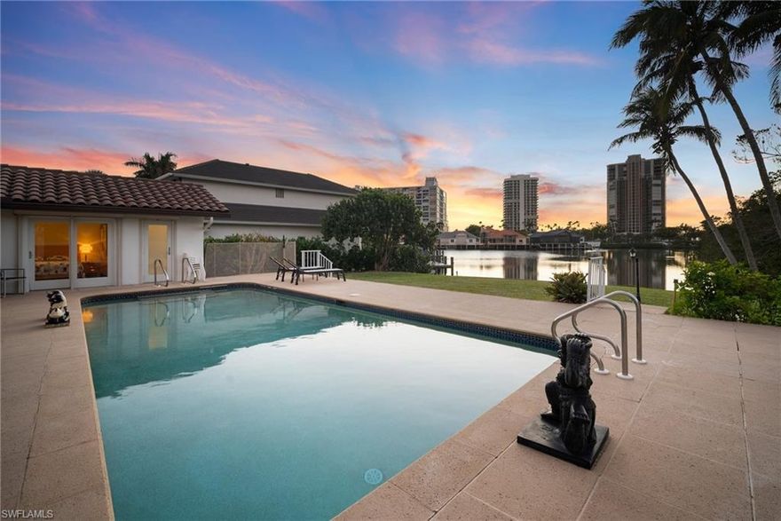 INCREDIBLE OPPORTUNITY PRICED AS LAND VALUE!! Nestled on a peaceful cul-de-sac in the coveted neighborhood of Park Shore, this stunning property offers 2,758 square feet of endless potential on a sprawling .64 ACRE LOT. This Gulf-accessible property features one of the largest, WIDE WATER VIEWS of Venetian Bay, presenting a rare opportunity to live the ultimate waterfront lifestyle. The existing 4-bedroom, 4-bathroom residence features impact glass, roll-down shutters, and a private pool, providing a solid foundation for your dream remodel. Alternatively, envision building a custom-designed, new construction masterpiece to take full advantage of the Western rear exposure and breathtaking sunsets. With NO FLOODING from recent hurricanes, this property is as secure as it is stunning. Located just moments from Seagate Beach and Park Shore's private beach access, you'll enjoy unparalleled convenience to Naples' finest amenities, including Waterside Shops, Venetian Village, and more.