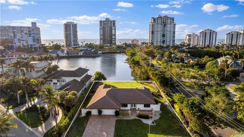 Photo of 319 Pirates Bight, NAPLES, FL 34103 (MLS # 225001658)