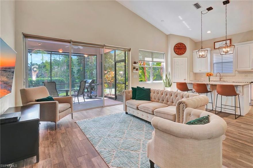 Incredible opportunity in Wilshire Lakes!  This meticulously maintained 3 bedroom, den, 2.5 bath southern exposure home has it all.  The remodeled kitchen has wood, slow close cabinets, an expanded island with wine refrigerator, new granite countertops and backsplash.  Wood look tile throughout the living area and remodeled den.  The master bath has been fully remodeled as well.  A New Roof was installed in 2018.  Enjoy relaxing on the extended lanai overlooking the lake.  There is plenty of room for a pool or you can enjoy the community pool and amenities.  Wilshire Lakes is a highly sought after community west of 75 and located in an "A" school zone: Vineyards Elementary, North Naples Middle and the new Aubrey Rogers High School.  Don't miss this opportunity - Easy to show - view today!