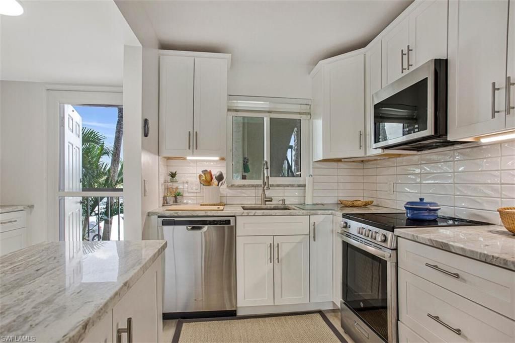 Photo of 4380 27th CT SW #202, NAPLES, FL 34116 (MLS # 226014056)