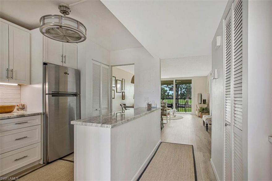 MUST SEE ---Beautifully updated and offered fully furnished. This reimagined residence features a bright, modern interior and a fantastic view of the soon-to-open golf course which has an on-site restaurant. Recent improvements include all-new white impact-resistant windows and an impact slider for enhanced safety and energy efficiency. Plus a retractable storm shade on the lanai. The home also offers a convenient coffee/wine bar with mini-fridge and a kitchen counter ideal for casual dining.
Residents enjoy exceptional on-site conveniences including covered valet trolleys, shopping carts, under building covered mailboxes, and delivery areas. Elevator for convenience The community provides a wide array of amenities such as a heated pool, pickleball, tennis, and bocce courts. A full calendar of social activities is available, including ladies’ lunches, yoga, exercise classes, bingo, movies, dances, special dinners, and more. You'll enjoy having somewhere to go and friends to be with.
Located close to everything Naples is known for—Downtown 5th Avenue, 3rd Street South, world-class dining and shopping, and the Naples Zoo— not to mention the sugar sand beaches. This property offers an ideal blend of comfort, convenience, and lifestyle. A move-in-ready opportunity in a vibrant, amenity-rich community.