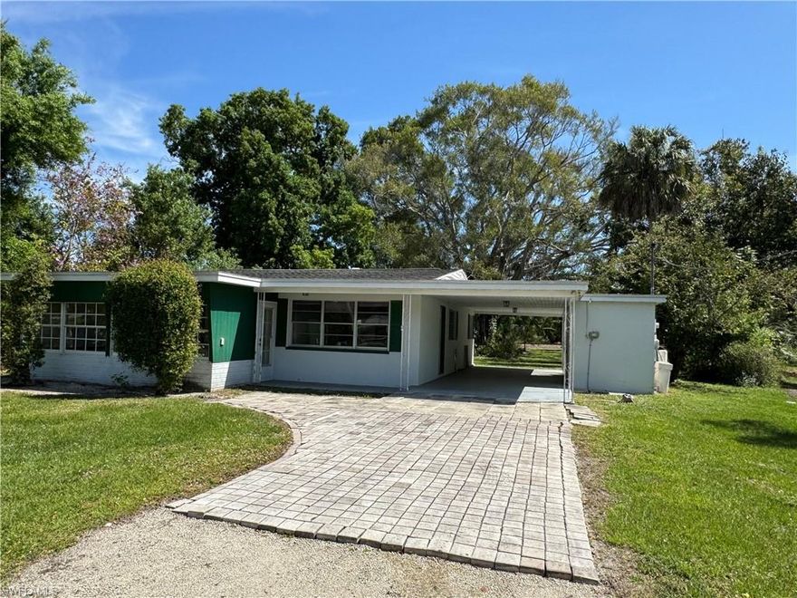Introducing a charming gem nestled in the heart of Fort Myers, this vintage 1956 home at 307 Chattanooga Drive offers cozy living with a touch of nostalgia. Royal Palm Park is close to the Caloosahatchee River, and the Flood Zone is AE. Boasting 1024 square feet under air, this quaint residence features two bedrooms, one bath, and a delightful Florida room bathed in natural light. Situated on a generous lot adorned with majestic trees, the property exudes a serene ambiance in a nice neighborhood. While a garage is absent, a conveniently attached carport provides shelter, accompanied by a separate laundry room accessible through the carport. Take advantage of the opportunity to make this adorable abode your own! Bring all reasonable offers!