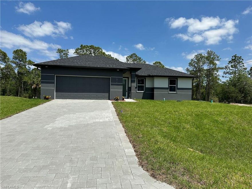 Don't miss this opportunity to own this beautiful home with 3bd, 2ba, 2car garage home with easy access to Palm Beach Blvd/FL 80, located in a super peaceful and quiet area but yet easy access to main roads. This home boasts beautiful curb appeal, impact windows and doors, epoxy garage and lanai floors as well as paved driveway, tile throughout, granite counter tops, garage door opener, stainless steel appliances including washer and dryer and much more! You will love this luxurious modern home located close to schools and grocery stores.