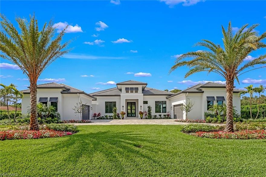 A single glance is all it takes to fall in love. Welcome to 12 Banyan—an exceptional estate offering over 4,500 square feet of refined living, where architectural elegance meets effortless comfort. A grand dual-entry driveway, lush tropical landscaping, and a freshly updated exterior set the tone for a striking arrival. Inside, award-winning interiors—curated with Clive Daniel furnishings and recipient of the 2022 Aurora Award for Best Interior Detailing—create a sophisticated yet inviting atmosphere. Soaring ceilings, expansive sightlines, and wide-format sliding glass doors flood the home with natural light while seamlessly blending indoor and outdoor living. Designed with both luxury and functionality in mind, the residence features two attached two-car garages, both air-conditioned—ideal for collectors, additional storage, or a climate-controlled workspace. Recent enhancements, including a freshly cleaned roof and newly sealed driveway, ensure a pristine presentation and added peace of mind. The home offers five spacious bedroom suites, each with a private full bath and generous walk-in closet. One suite serves as a versatile oversized great room, perfect for a media lounge, guest retreat, or multi-purpose living space. The primary suite is a true sanctuary, highlighted by dramatic windows, a private sitting area, dual walk-in closets, spa-inspired finishes, and a tranquil outdoor shower. Set on 1.15 acres, the property delivers ultimate privacy and a resort-style experience. Enjoy expansive covered outdoor living areas, a fully equipped outdoor kitchen and grill, and a private pool and spa overlooking a serene, lush landscape. A 1,000-gallon propane tank supports seamless outdoor entertaining. Ideally located less than five minutes from the beach and the Naples Ritz-Carlton resorts, and just moments from Waterside Shops, Mercato, and the vibrant dining, shopping, and entertainment of 5th Avenue South. Impeccably maintained and thoughtfully enhanced, 12 Banyan represents a rare opportunity to own a truly distinguished luxury residence.