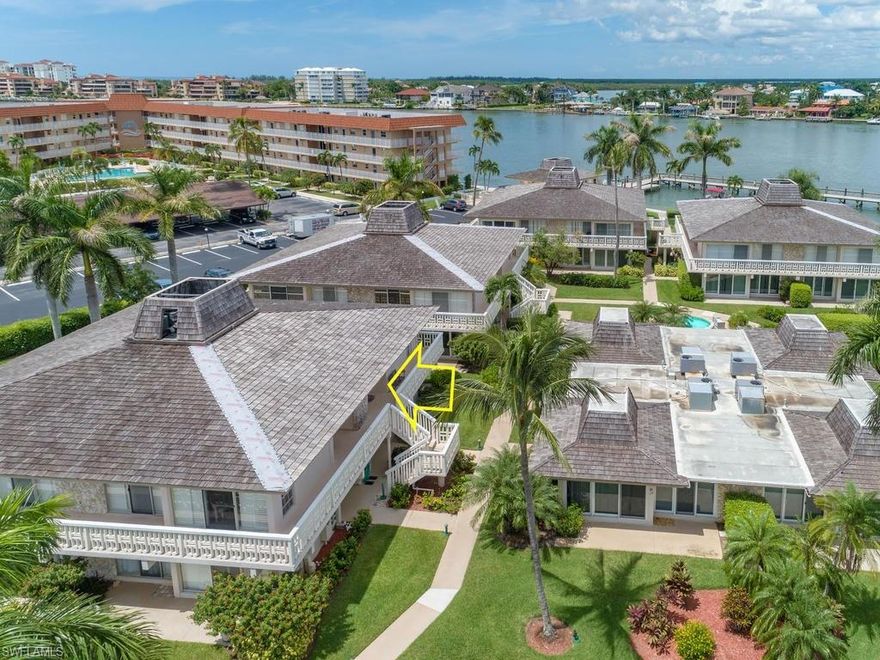 Seller to pay HOA dues through December 2020 at closing!! Paradise awaits you at this beautifully REMODELED condo located in a water direct community on Marco Island! Enjoy condo living at this open layout, 2nd floor unit which includes TILE flooring and PERGO throughout, crown molding throughout, BRAND NEW stainless appliances, full size BOSCH washer and dryer, an extra-large walk in shower, and being sold TURNKEY furnished. Enjoy sunset and sunrises on the lovely private wrap around decks. Enjoy fishing, boating, dolphins, and some of the best restaurants that Marco Island has to offer! You only need to bring yourself and your suitcase! This is the BEST DEAL in Olde Marco.