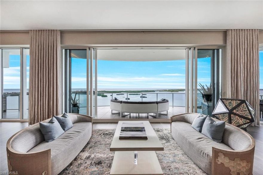 EXTREMELY SOUGHT-AFTER OMEGA 03 STACK WITH COTTAGE AND 3-CAR GARAGE boasting the highest ceilings in OMEGA, the 25th floor! This lavishly appointed Omega home will wow you the moment you enter its custom glass doors. Infinite non-obstructed views of the iconic Estero Bay & Gulf of Mexico, complete with private views of the preserve & golf course, you will understand why this position is coveted. Distinctive details are implemented. Stunning wood flooring, custom quartz countertops, Irpinia cabinetry, striking wall treatments, contemporary lighting, state-of-the-art sound system, & climate-controlled wine wall hosting up to 600 bottles. Spacious entertaining areas inside and out. Enjoy grilling on the wrap-around lanai where you never miss a sunset. The fully equipped cottage (over 800 sq ft) is a separate place where guests can enjoy privacy and lengthy stays. Omega incorporates ultra-modern design and amenities for its residents, including an open-air rooftop lounge with a fire pit, bar areas, & hot spas. In addition, Bonita Bay offers multiple opportunities for golf course membership, a marina, a beach club, & so much more.  Make this opulent home your next best address today!