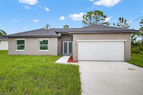 Photo of 937 Asther ST E, LEHIGH ACRES, FL 33974 (MLS # 226029031)