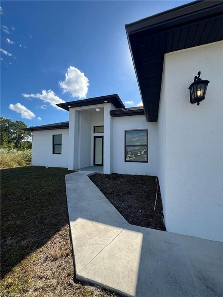 Welcome to Paradise. This home is located in one of Lehigh Acres most sought-after neighborhoods. With access to major highway, parks, schools, shopping and more you are close to everything. The pride in construction will amaze you. The entry leads you to a spacious 3 bedroom plus den gem offering you so many custom features including, porcelain floors, quartz kitchen and bathrooms top, 8ft interior doors and awesome 10ft ceilings and impact windows. The extra wide lanai awaits you to enjoy the weather that will warm your soul daily. This home has everything that the Florida lifestyle has to offer. Come and claim your piece of Paradise.