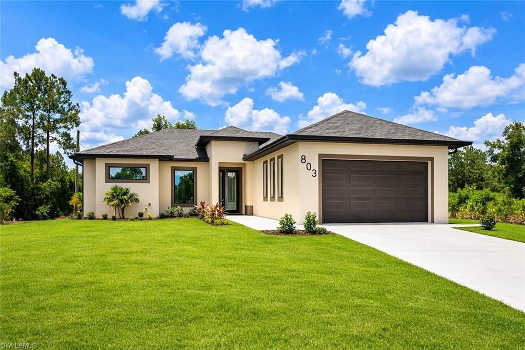 Photo of 803 E 16th ST, LEHIGH ACRES, FL 33972 (MLS # 226010661)