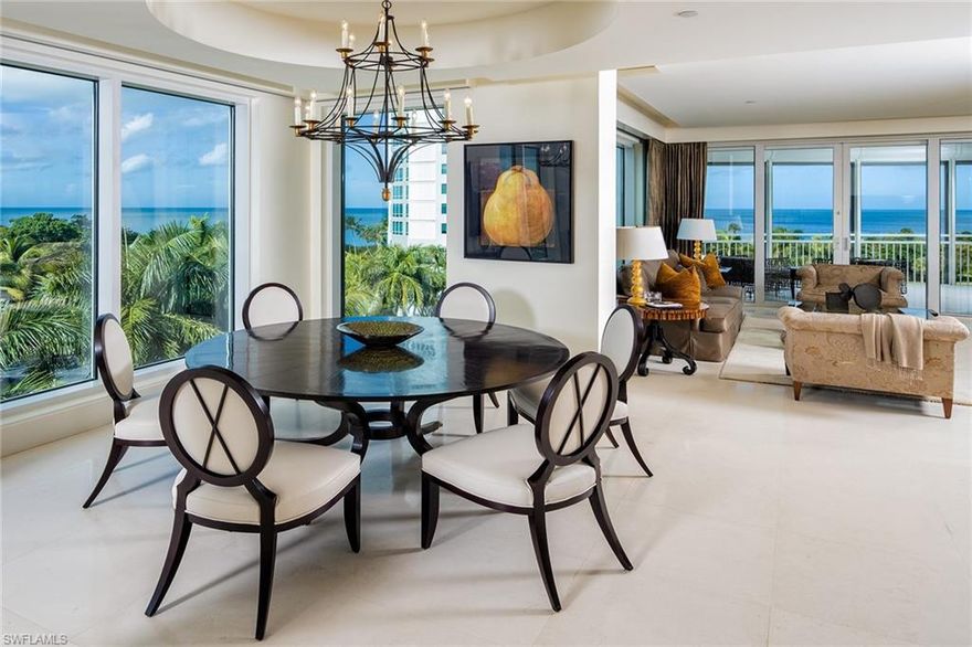 Located at the intersection of chic and elegant, this beachfront condo was completely remodeled and reconfigured to realize a refreshingly stylish space. The semi-circular floor plan of the ’02 unit provides a myriad of seating areas, both inside and out, all of which revolve around a sleek AlliKristé custom kitchen. Fashionistas will appreciate the grand closet enclosed within the master bedroom and the collection of ivory shagreen wallpapered full-length custom closets outlining the perimeter of the room. Designer light fixtures, marble tile, lush carpet, geometric ceiling details and a sophisticated Control 4 system throughout the home confirm no detail was left to chance in this vogue space. Comfortably set back from the shoreline, the luxurious Provence tower boasts azure Gulf of Mexico views framed in tropical greenery to the north, south and west, with Naples cityscape views to the east. A resort-style pool and spa, workout room, tennis court, library and a spacious community room with a super-size television and grand piano, promise upscale living 365 days a year.