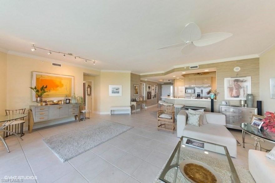 WOW!  The view is wide open and beautiful from sun-up to sunset.  Open kitchen looks on to great room and offers spacious entertaining opportunities.  
Ask about the newly renovated on-site Tarpon Cove Yacht and Racquet Club membership which offers a multitude of amenities; boating, beach access, tennis, dining indoor and poolside and many social programs.  Transfer of membership is available.