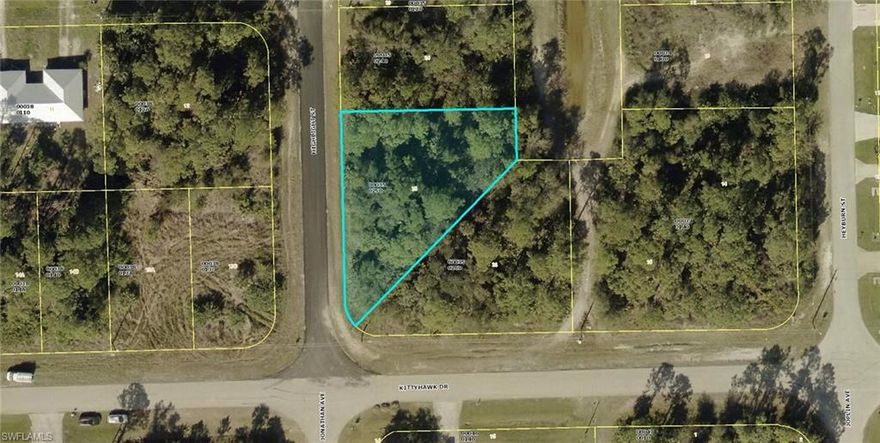 Premium corner lot at 1/3 of an acre. Adjoining lot of the same size is also available. Together would give almost 2/3 acre. Both lots back up to the end of one of the canals. Canals neander in and out of the many streets in the area. Quiet and semi-secluded area of new homes and just minutes to Fort Myers. If you love a country setting, this is IT. Room for a larger home and or an additional building for garage, work or play. Simply one of the BEST options for new home builders.