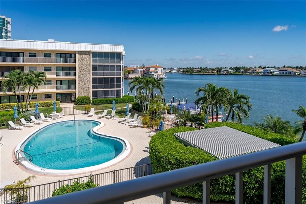 Photo of 3450 Gulf Shore BLVD N #315, NAPLES, FL 34103 (MLS # 225073296)