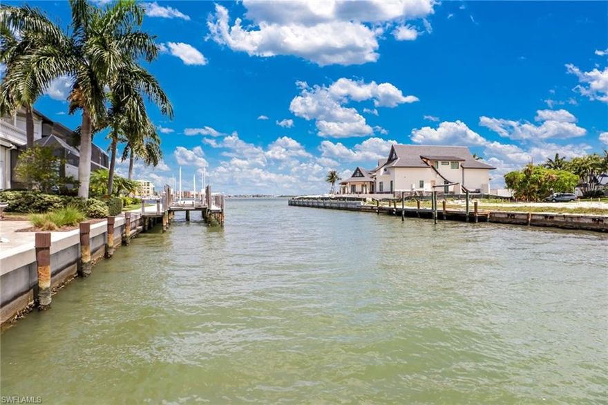 PRICE REDUCTION! 1221 Butterfly Court is a home for individuals who love the water! This four-bedroom four-bath home has been recently updated and lives like a coastal home. Everything is focused on outdoor living. The outside boasts a screened lanai with a pool, spa, pool bath, and outdoor kitchen and fireplace. There is a concrete pad that allows seating and umbrellas with a firepit beside the dock area. The dock has a boat and jet ski lift. There is a fish cleaning table, electricity, and water available for the avid fisherman. A wide canal provides direct access to the river and Gulf of Mexico with no bridges. The interior of the home is decorated in bright coastal colors and features a large kitchen with a bar and eat-in dining area. To make things cozy there is a fireplace in the living room, three living areas, a dining room, an office, a first-floor master with lanai access, an upstairs balcony, and three ensuites. This home is in immaculate condition. The pool has recently been converted to salt water. There is a new boat and 2 jet skis on the property that are NOT included in the purchase price but are for sale with the home.