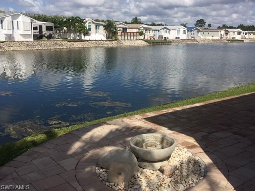 Imperial Wilderness R.V. Resort:55+ community: Beautiful 1994 Chariot Eagle park model, situated in a cul-du-sac, on the water, rare over sized water front(sea wall)( 90 feet of lake front),1 bedroom with the possibility of a second bedroom, stove, new refrigerator, new microwave, new dishwasher, new water heater, laminate floors, fabulous paved patio, pavers all around the house, furnished, beautifully landscaped, shingled roof, a slice of paradise.
Site includes:Water, Sewer, Cable T.V., Irrigation, Tel. availability, Heated swimming pools and jacuzzis, Tennis court, Shuffleboard, Welcome center, Clubhouse with dance floor and banquet facilities, pool tables, Library, Laundries, restrooms with showers, planned social activities and events, GATED SECURITY, OWN YOUR LAND.
A MUST SEE.