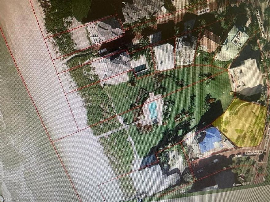 One of the largest double lot Barefoot Beach properties is now available.  Original home has been torn down and lot cleared - needs no fill.  Barefoot Beach allows 4 story homes 70' NAVD.  This lot is large enough to accommodate a large horizontal footprint with elevated swimming pool and large outdoor living areas. Beach Garden K is located on one of the quietest areas on Barefoot Beach is tropically landscaped with a beautiful pool overlooking the Gulf of Mexico. Although this is a double lot there is only a single lot assessment for this property.  Also available is a Boat dock across the street convenient to this property with no bridges to the Gulf.  Barefoot Beach Garden residents have a clubhouse with fitness, tennis and pickleball all included in the quarterly fee.  Barefoot Beach is a guard Gated community with 24 hour guard patrols.  Sellers will transfer their plans or design your own.