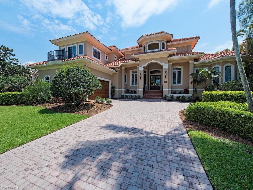 H.10620  Distinctive Elegance! Sunny, Southern Exposure in this Stately waterfront home. 24,000 # boat lift and jet ski lift, 50' dock, 30'x24' boat slip provides direct access to Naples Bay and the Gulf of Mexico. 14' coffered ceilings with accent lighting, marble floors, extensive crown molding and fireplace in the formal living/dining area. Gourmet kitchen with granite countertops, elegant cabinetry and island which opens to family room and pool. Expansive 1st floor master retreat with dual walk-in closets overlooking the pool & spa. Private 2nd floor guest suite with sitting area, balcony and bay views. Great attention to detail.