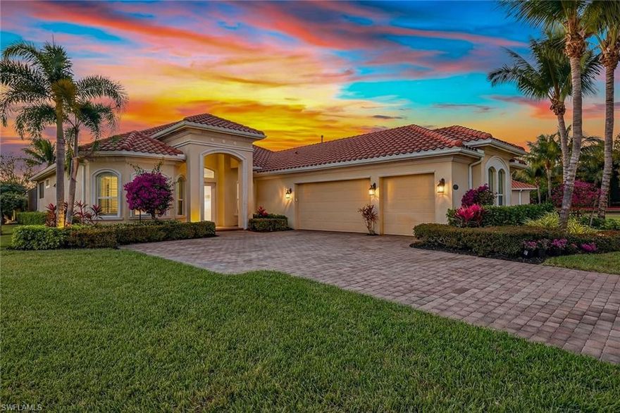 Looking for a carefree Florida lifestyle? This is the home for you. This home has many desirable features that are not usually found in a single residence in the Fiddler’s Creek community. These features include stunning sunsets reflecting off the serene rear lake, an extra-wide, expansive front lawn that sets you substantially apart from adjacent neighbors and an enclosed pool area with recently upgraded no-see-um screens. The open floor plan is accentuated by 12-foot-high ceilings, most of them coffered, along with recently installed high-grade luxury vinyl plank wood-like flooring. The lanai has been thoughtfully landscaped for privacy with lush plantings and accessible private garden areas on each side. The home is off the beaten path on a quiet cul-de-sac street in the sought-after Chiasso section of Fiddler’s Creek. It features three bedrooms plus a study, three-and-a-half baths (including a pool bath), and a spacious three-car garage, all with impact windows and doors. The foyer opens to a formal dining area with a coffered ceiling and arched windows, while the large great room and kitchen also offer a coffered ceiling. The study has French door entry and an arched window. The kitchen is appointed with granite countertops and a full backsplash, white cabinetry, pendant lighting and premium appliances, including a five-burner natural gas cooktop. A connecting walkway to the formal dining area includes a walk-in pantry and a dry bar with custom overhead wine shelving and an under-counter wine cooler, ideal for entertaining. The primary suite offers a tray ceiling, plantation shutters, lanai access, and sweeping pool and lake views, along with a spacious walk-in closet with wood shelving. The main bath features porcelain tile flooring, granite counters, a soaking tub and floor-to-ceiling tiled walk-in shower with frameless glass. Two guest bedrooms are served by an adjoining bath and nearby three-quarter bath. The laundry room includes granite counters, wall cabinetry, a utility sink, and front-load washer and dryer. A newer HVAC system provides added comfort and efficiency, and the CDD is paid in full. Fiddler’s Creek is a highly rated Naples community. Residents enjoy a premier resort lifestyle with beautifully landscaped grounds, outdoor activities, a poolside grill, 10 pickleball courts, tennis courts, bocce ball and various pools, including a children’s pool and a lap pool. The large fitness center is equipped with virtually every type of exercise equipment imaginable. Optional membership offers access to the championship golf course, new golf clubhouse, marina and beach club. Furnishings are negotiable.