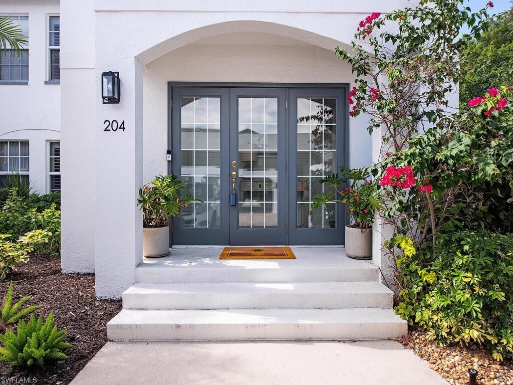 Photo of 823 Tanbark DR #204, NAPLES, FL 34108 (MLS # 225078360)