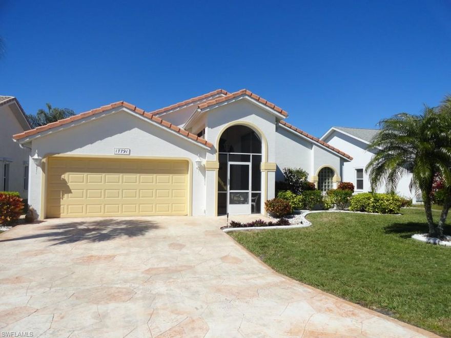 VIEW~VIEW~VIEW!  Located on a quiet street, this home is a GREAT VALUE-Priced less than $107 per sq. ft. under air with a FABULOUS LAKE VIEW + No Cart Path!  This SPACIOUS TURNKEY HOME IS TASTEFULLY FURNISHED and features Three Bedrooms, 2 Baths, 2 CAR GARAGE, Formal Living Room, Kitchen with Butler's Pantry, FAMILY ROOM + DEN.  A few of the Numerous Updates installed in 2014 include New LAMINATE FLOORS, New TILE FLOOR IN GB, New CARPET, New COMMODES, New INTERIOR PAINT, New FAUCETS, All New Stainless Steel Kitchen APPLIANCES, and New WINDOW COVERINGS.  A TOTALLY BRAND NEW 10' X 23'  SCREENED LANAI-WAS JUST COMPLETED + the large front entry has been re-screened.  Owners Quarters boast a Very Spacious Bedroom with French Doors to the Den and a Bath featuring Dual Vanities, Garden Tub + Separate Shower.  Floor Plan offers Split Bedrooms for privacy, and flexible living spaces to make your own.  AC has been replaced, and the  HURRICANE GARAGE DOOR INSTALLED IN 2013 IS INSULATED + MEETS MIAMI DADE CODE FOR 195 MPH WINDS.  Low Maintenance Fees of $199 per month pd quarterly cover Lawn Care, Re-painting of Exterior, Basic Cable + Membership in the Club with it's Resort Style Amenities.