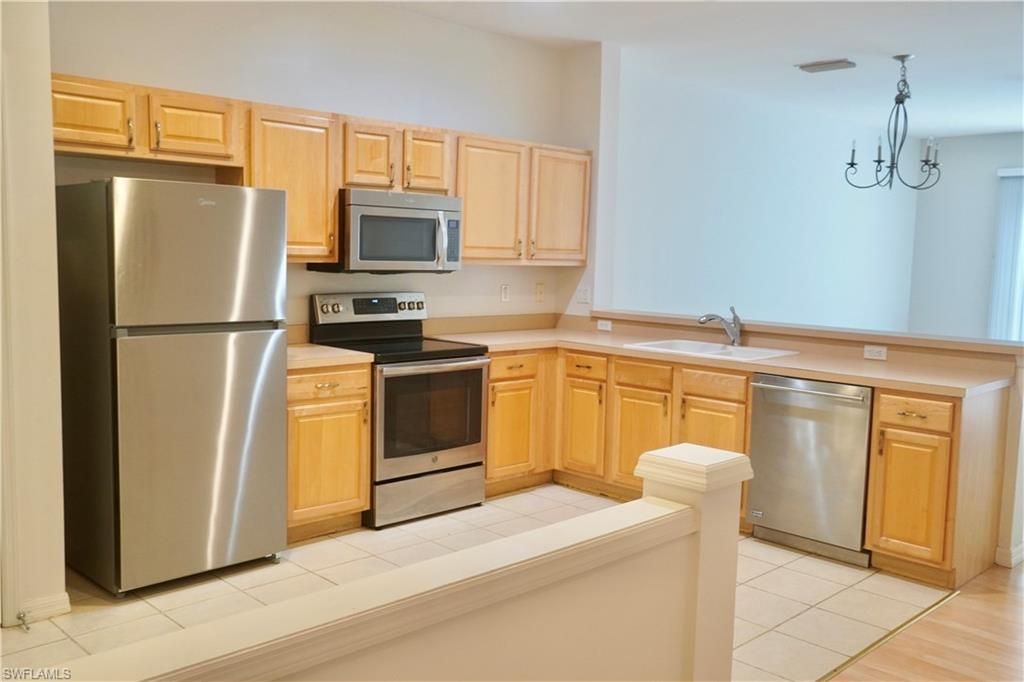 Photo of 15583 Marcello CIR #145, NAPLES, FL 34110 (MLS # 226017447)