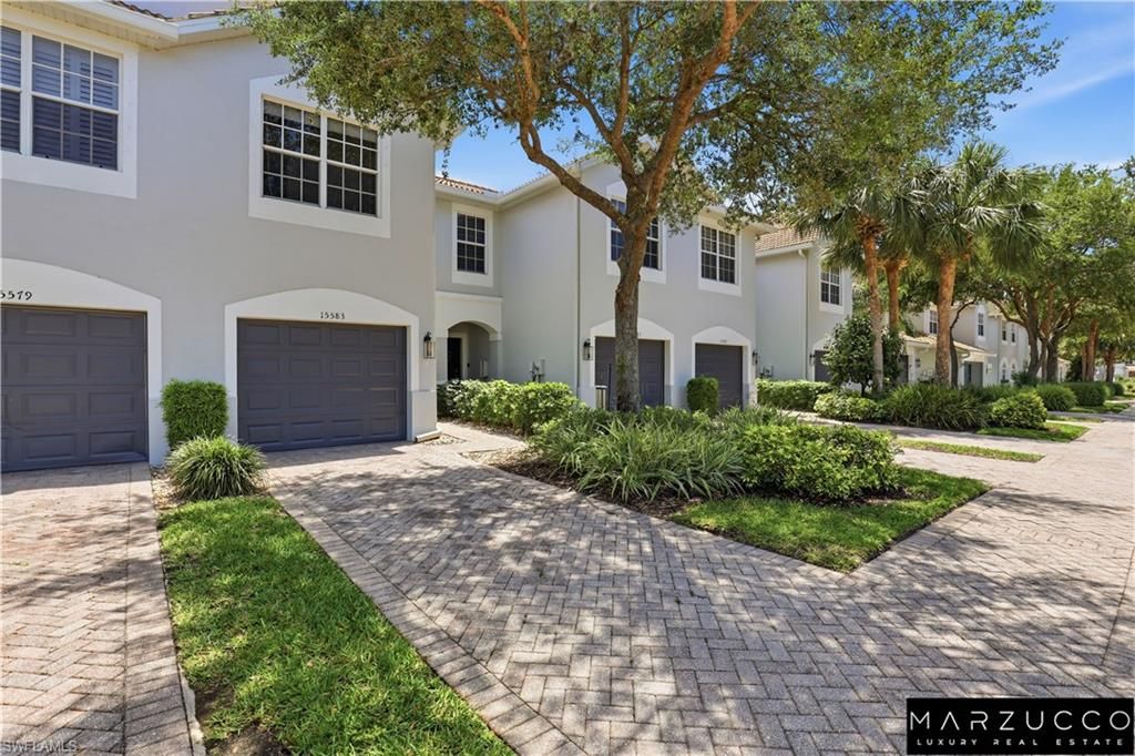 Photo of 15583 Marcello CIR #145, NAPLES, FL 34110 (MLS # 226017447)