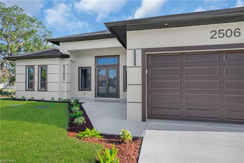 Photo of 2506 51st ST SW, LEHIGH ACRES, FL 33976 (MLS # 226019988)