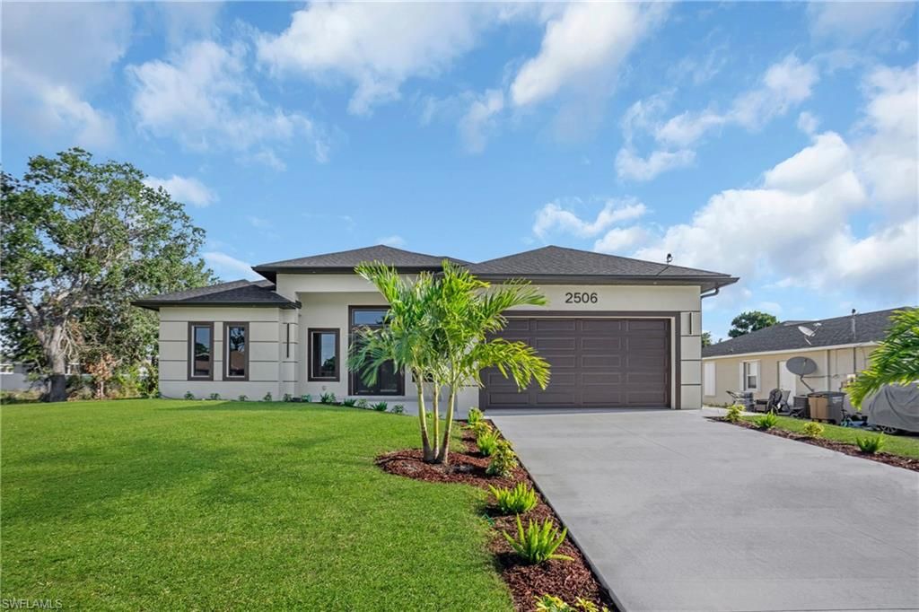 Photo of 2506 51st ST SW, LEHIGH ACRES, FL 33976 (MLS # 226019988)