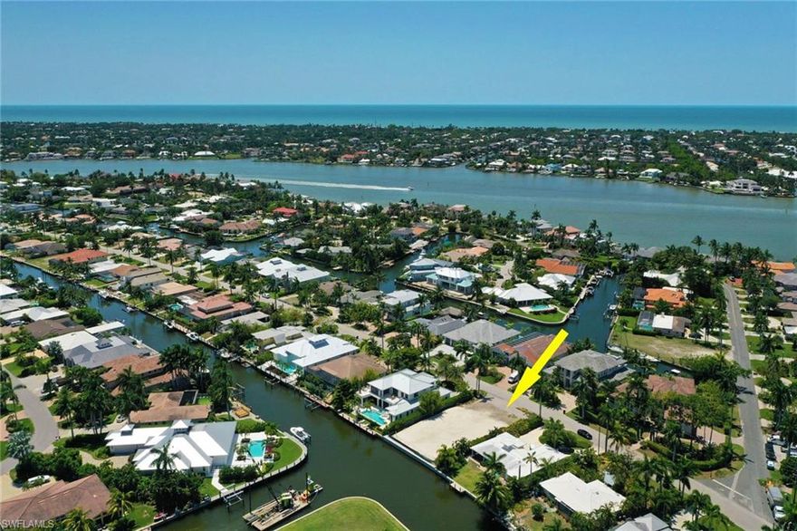 This is the perfect lot for the avid boater who also craves the pedestrian lifestyle of downtown Naples and 5th Avenue. This South-facing gem in the coveted Royal Harbour community is positioned at the intersection of two canals offering long water views in all directions. Brand-new seawall just installed. This lot purchase includes the architectural / structural plans and active building permit. The concrete pilings have just been completed and the home is ready to be customized for the new owner, by award winning luxury home builder Milestone Development & Design, Inc. This home is a gorgeous blank canvas awaiting the personal spirit of the future owner to complete the masterpiece. GET A JUMPSTART AND SUBSTANTIAL DISCOUNT ON A HOME READY FOR SEASON 2021. Some MLS details based on future build. Price is for lot package at current stage (slab ready).