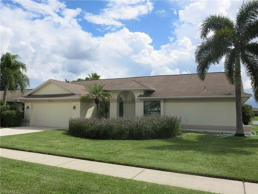 Remodeled and stylish. Tons of natural light in the south facing lot with stunning lake views. Marble flooring. Rich toned wood cabinetry in kitchen with white granite counters, high end appliances including an induction cooktop for quicker cooking keeping safety in mind with cool touch technology.  Water views from all rooms except one bedroom and baths. Formal living. formal dining, family room, 3 bedrooms and a den/office. Absolutely stunning master bathroom with slipper tub with separate frameless shower featuring rain shower head, European style cabinetry, upscale lighting, bidet and toilet.  Impact windows and sliders.  Manual shutters  keep the lanai private and clean.  Stylishly designed guest bath. Low HOA fees. Community pool and tennis courts within walking distance.  Great neighborhood. Sidewalks and street lights surround this family community. This is a must see.