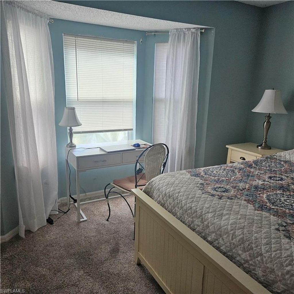 Photo of 915 New Waterford DR #H202, NAPLES, FL 34104 (MLS # 226011291)