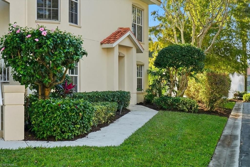 Photo of 1109 Egrets Walk CIR #104, NAPLES, FL 34108 (MLS # 225083211)
