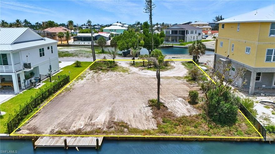 Seize a rare chance to build your dream home on this cleared, build-ready canal-front lot perfectly positioned in the heart of Fort Myers Beach. Offering direct Gulf access, this property is ideal for boating enthusiasts seeking quick, scenic routes through Southwest Florida’s waterways.

Set just one block south of Publix Supermarket, Snook Bight Marina, and some of the island’s most popular dining spots—including casual favorites like Junkanoo Below Deck and refined options such as Fresh Catch Bistro—you’ll enjoy unmatched convenience and walkability.

What truly sets this opportunity apart is the remarkable transformation happening all around it. New construction is emerging up and down the street, with neighboring properties undergoing complete redevelopment. This wave of revitalization is elevating the look, feel, and long-term value of the entire block—making this an exceptional moment to invest or build.

Situated mid-island, the location offers easy access in both directions: head north to the reimagined Fort Myers Beach downtown, or drive south toward Bonita Springs and Naples for upscale shopping, fine dining, golf, and entertainment. Even travel is effortless with RSW International Airport only a short distance away.

Directly across the street, the sugar-white sands and shimmering turquoise waters of the Gulf of Mexico invite you to enjoy morning beach walks, afternoons in the sun, and unforgettable sunset cocktails steps from home.

Whether you envision a serene personal retreat, a high-demand income property, or a custom luxury residence, this exceptional lot delivers unbeatable location, strong future appreciation, and the chance to be part of a beautifully renewed coastal neighborhood.

Build the lifestyle you’ve imagined—this is more than a homesite; it’s a rare opportunity in one of Fort Myers Beach’s most exciting redevelopment corridors.