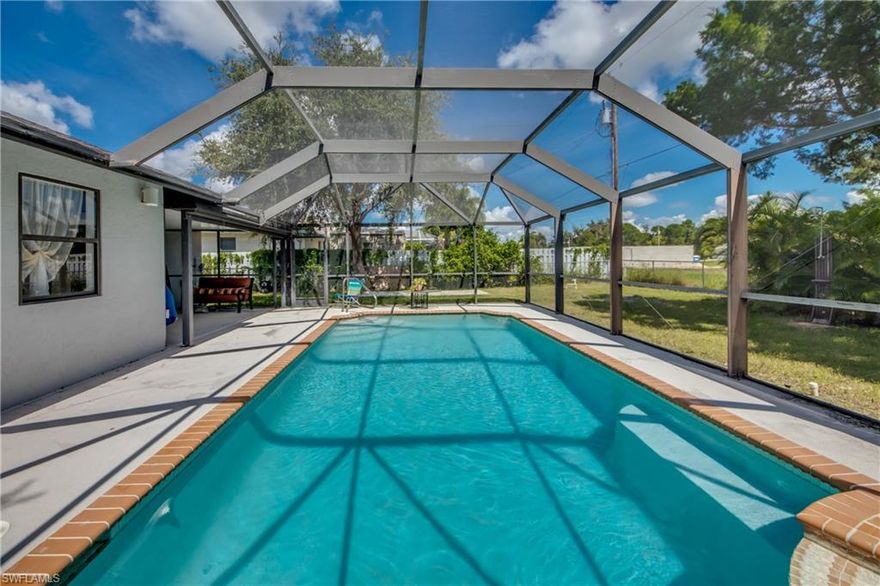 Welcome to Paradise! This Beautiful 3/2/2 Pool Home is located in the very desirable NW CAPE.. If you love to entertain, this home is perfect for you! Featuring granite counter tops, beautiful Tile floors, a large screened Lana/ pool area, slider doors open up the entire living area to bright sunlight throughout. Incredibly spacious master suite with oversized closet. The homes color schemes and decor emphasizes Florida living at it's Finest! Close to Dining, shopping and Downtown Ft. Myers. Just a short drive to the International Airport. Location is everything! Be sure to check out the virtual tour.